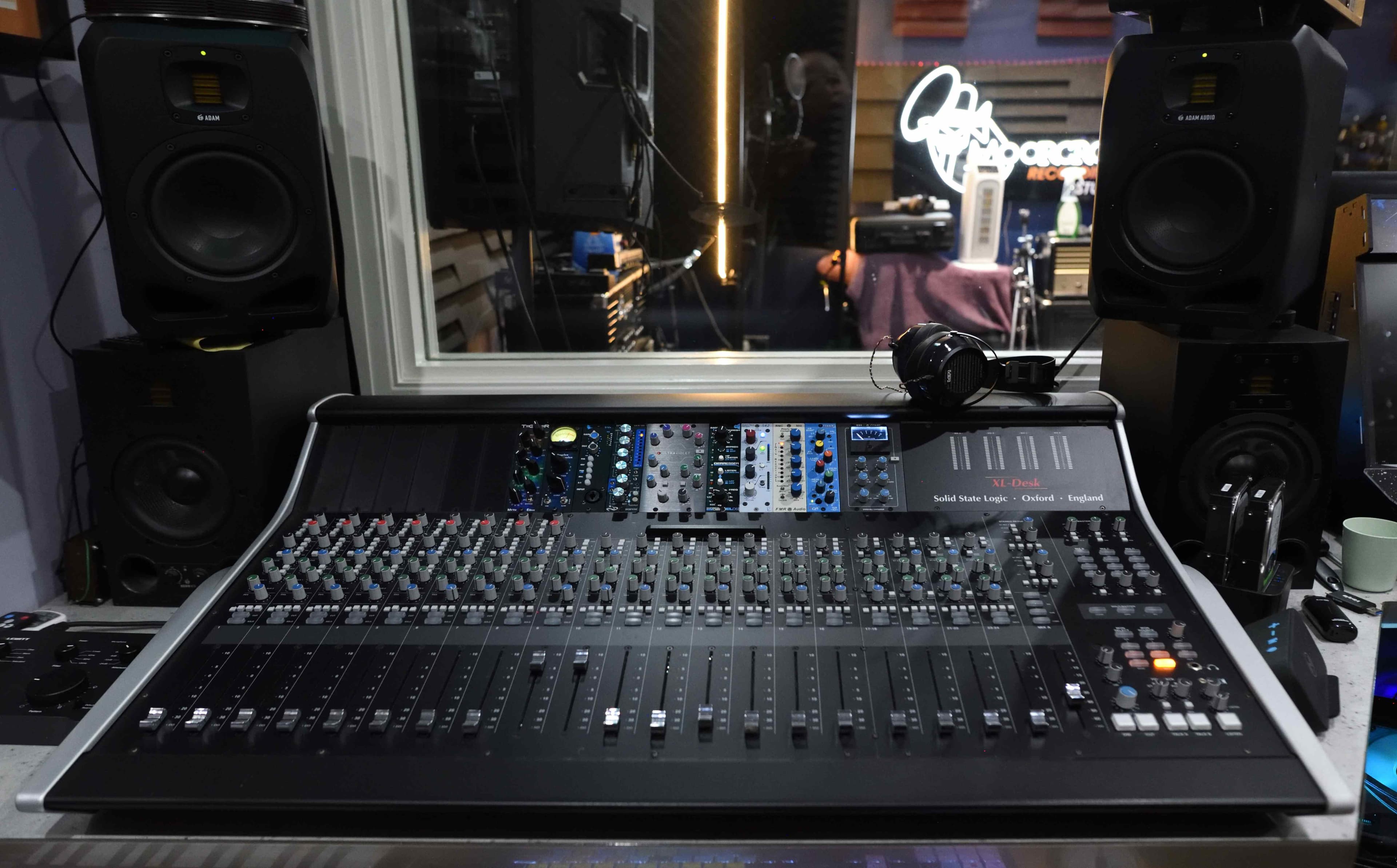 SSL XL-Desk analogue console and ADAM Audio monitors in the Moorcroft Studios control room
